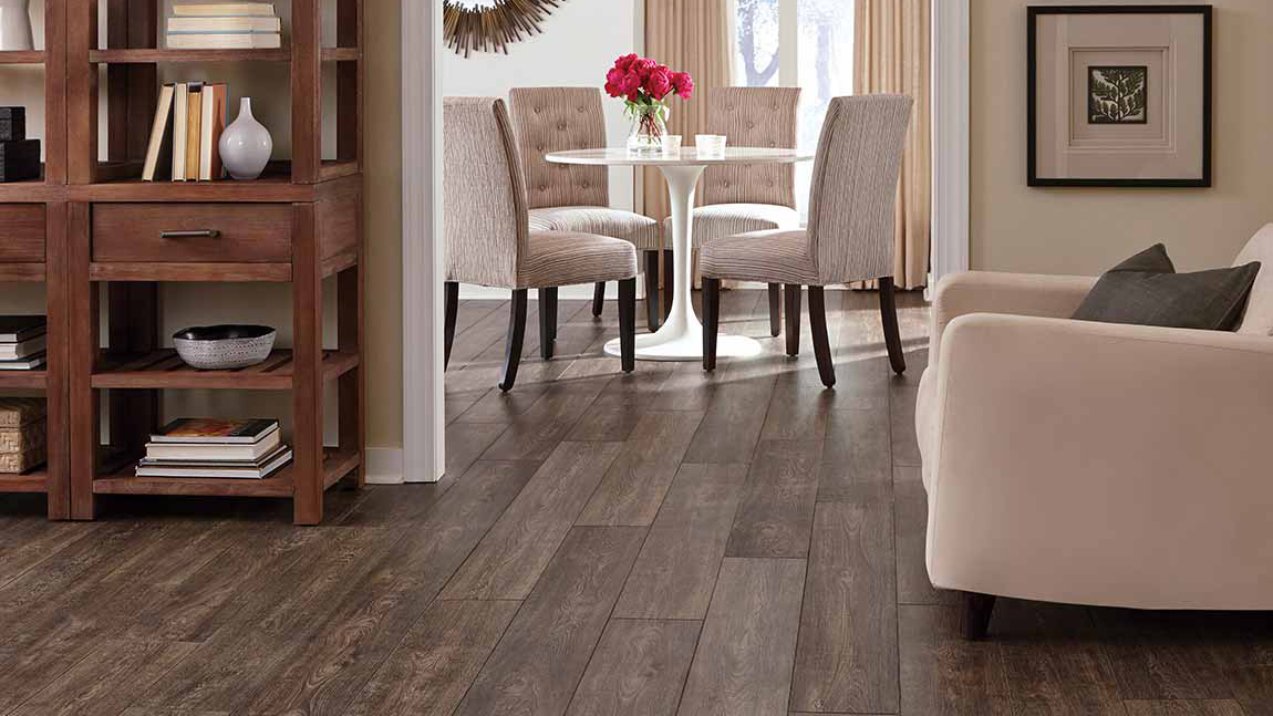Laminate wood flooring in living room and dining room